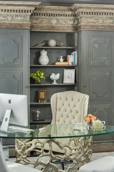 Elegant home office with tufted wingback chair