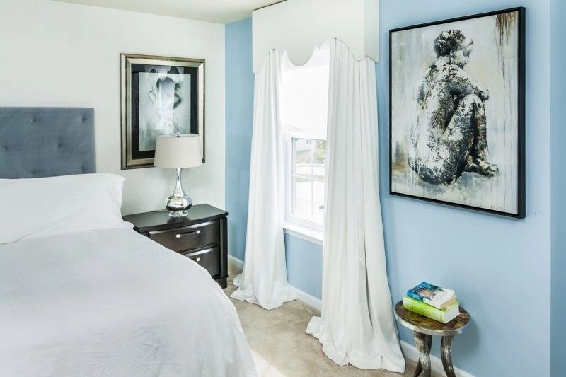 Serene modern bedroom with blue accent walls