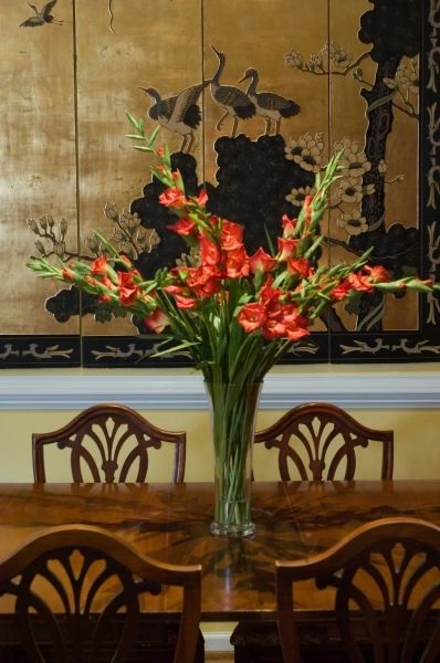 Classical dining room with floral arrangement